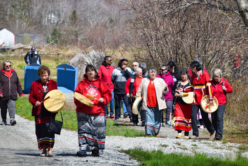 A walk in recognition of the National Day of Awareness for  Missing, Murdered Indigenous Women was held at the Black Loyalist Heritage Center in Birchtown on May 5, 2023. Red dresses dotted the trail on the grounds while the gentle sounds of Mi’kmaw drumming and singing filled the air during the walk. KATHY JOHNSON