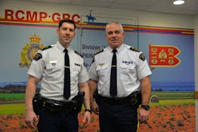 P.E.I. Supt. Kevin Lewis, left, joins RCMP Commissioner Michael Duheme on Dec. 12 at L Division headquarters in Charlottetown. Duheme was in Charlottetown as part of a tour of each RCMP Division in Canada. Terrence McEachern • The Guardian