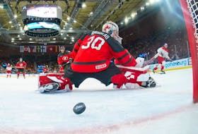 Team Canada goalie Mathis Rousseau is unable to react in time to stop a deflected pass from getting past him with 11 seconds left in a 3-2 quarter-final loss to Czechia at the IIHF World Junior Championship in Gothenburg, Sweden on Tuesday. - IIHF