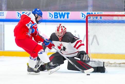 Canadian goalie Rhyah Stewart of Antigonish makes a save on Czechia's Veronika Hujova during action at the IIHF world women's under-18 hockey championship in Zug, Switzerland, on Sunday.- IIHF