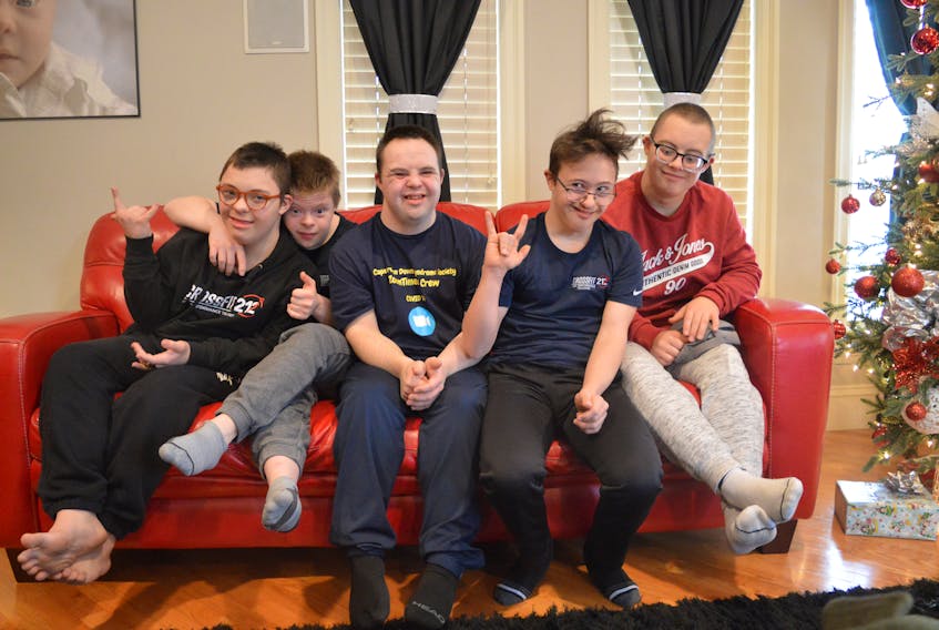 From left, Charles LeVatte, Owen Long, Max Murphy, Nico Georghiou and
Will Rudderham are members of the Cape Breton Down Syndrome Society ZoomTimers Crew. Their virtual meetings inspired a Cape Breton University research project that studied the benefits social and educational inclusion have on people with intellectual disabilities. Chris Connors/Cape Breton Post