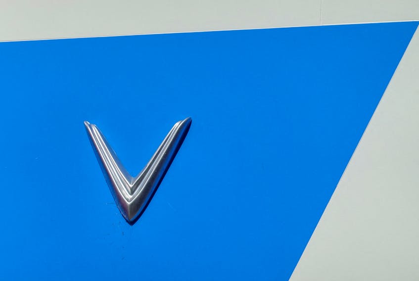 A VinFast electric vehicle logo is shown atop one of the company's retail locations in San Diego, California, U.S.,October 20, 2023.