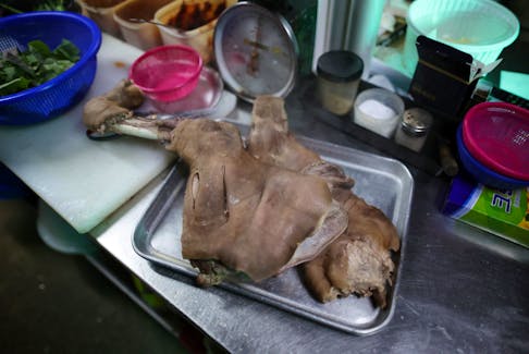 Boiled dog meat is pictured at a restaurant in Hwaseong, South Korea, November 21, 2023.  