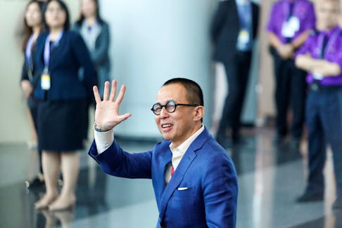 Richard Li, Hong Kong businessman and younger son of tycoon Li Ka-shing, waves as he arrives to vote during the election for Hong Kong's next Chief Executive in Hong Kong, China March 26, 2017.  