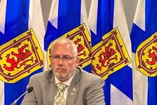 Justice Minister Brad Johns speaks with reporters at the media room across from Province House in downtown Halifax on Thursday, July 13, 2023. - Francis Campbell