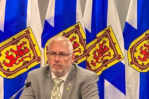 Justice Minister Brad Johns speaks with reporters at the media room across from Province House in downtown Halifax on Thursday, July 13, 2023. - Francis Campbell
