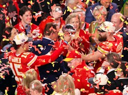 Kansas City Chiefs' Patrick Mahomes and Travis Kelce celebrate with the Vince Lombardi Trophy after winning Super Bowl LVIII against the San Francisco 49ers at Allegiant Stadium in Las Vegas on Sunday, Feb. 11, 2024. - Mike Blake / Reuters
