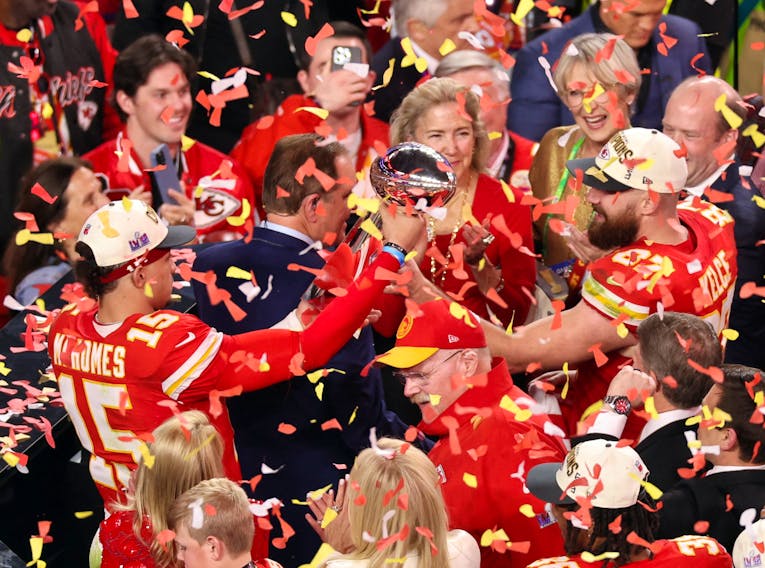 Kansas City Chiefs' Patrick Mahomes and Travis Kelce celebrate with the Vince Lombardi Trophy after winning Super Bowl LVIII against the San Francisco 49ers at Allegiant Stadium in Las Vegas on Sunday, Feb. 11, 2024. - Mike Blake / Reuters