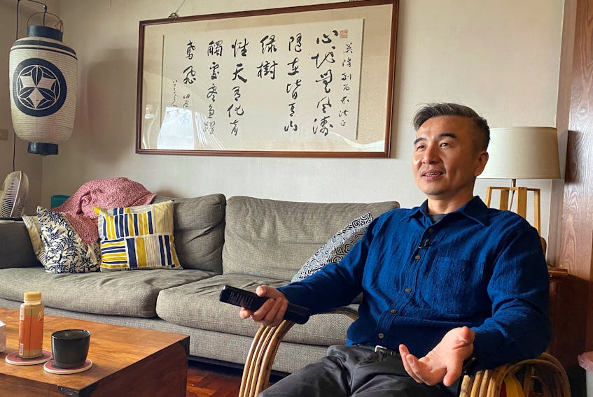 S. Leo Chiang, director of the Oscar-nominated Taiwanese short documentary 'Island in Between', speaks during an interview with Reuters at his house in Taipei, Taiwan February 6, 2024.