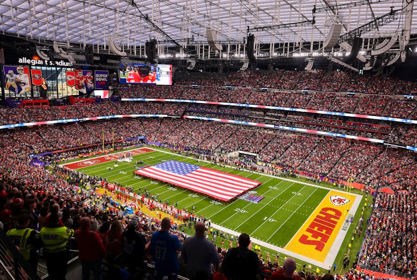 Football - NFL - Super Bowl LVIII - Kansas City Chiefs v San Francisco 49ers - Allegiant Stadium, Las Vegas, Nevada, United States - February 11, 2024 A general view of a flag of the United States on the field before the game