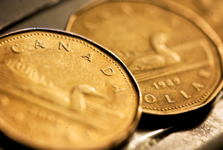 Canadian one dollar coins, also known as loonies, are displayed in Montreal, September 19, 2007.