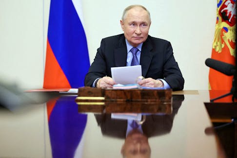 Russian President Vladimir Putin chairs a meeting with members of the Security Council via video link at the Novo-Ogaryovo state residence outside Moscow, Russia February 13, 2024. Sputnik/Alexander Kazakov/Pool via REUTERS /File Photo