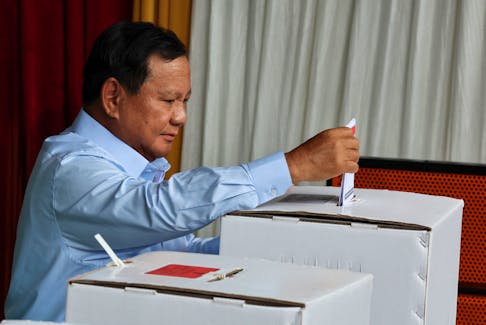 Presidential candidate Prabowo Subianto votes at a polling station during the general election in Bogor, West Java, Indonesia, February 14, 2024.