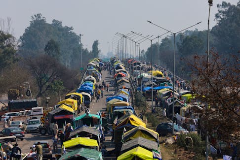 Trolleys belonging to farmers, who are marching towards New Delhi to press for better crop prices promised to them in 2021, are parked on a national highway at Shambhu, a border crossing between Punjab and Haryana states, India, February 15, 2024.