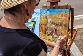 Artist Lise Genova paints during a public event in downtown Summerside. Genova is one of many recipients of this year’s Summerside Heritage and Culture Awards, which will be presented March 15 during the annual Mayor’s Heritage Tea. Culture Summerside