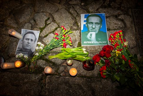 Tributes are laid next to the Monument to the Victims of Stalinism following the death of Russian opposition leader Alexei Navalny, reported by prison authorities in Russia's Yamalo-Nenets region where he had been serving his sentence, in Wroclaw, Poland, February 16, 2024. Tomasz Pietrzyk/Agencja Wyborcza.pl via REUTERS ATTENTION EDITORS - THIS IMAGE WAS PROVIDED BY A THIRD PARTY. POLAND OUT. NO COMMERCIAL OR EDITORIAL SALES IN POLAND.