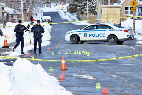 Members of the Halifax regional police forensics service process the scene of an early morning shooting that sent a person to hospital on Leahy Road at Catherine Street in Dartmouth Monday, February 19, 2024.

TIM KROCHAK PHOTO