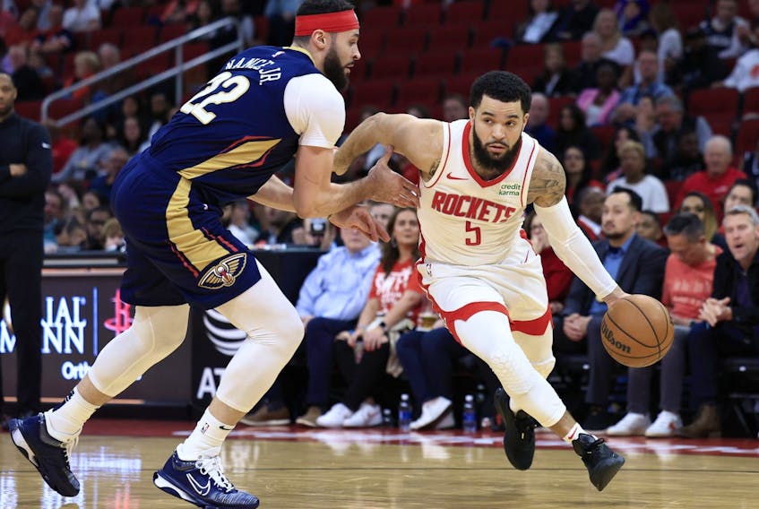 Fred VanVleet, right, of the Houston Rockets dries around Larry Nance Jr. of the New Orleans Pelicans during the first half at Toyota Center on Wednesday, Jan. 31, 2024, in Houston. 