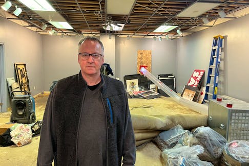Doug Cranford, who owns Ellen’s Creek Gallery and Framing with his wife, Gloria, is grateful to the Charlottetown Fire Department for their quick actions on Jan. 30 when a fire broke out in the apartment above the gallery. Firefighters helped rescue more than 100 paintings. Dave Stewart • The Guardian