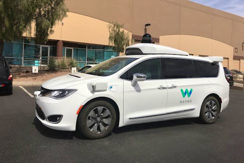 A Waymo self-driving vehicle is parked outside the Alphabet company's offices where its been testing autonomous vehicles in Chandler, Arizona, U.S., March 21, 2018. 