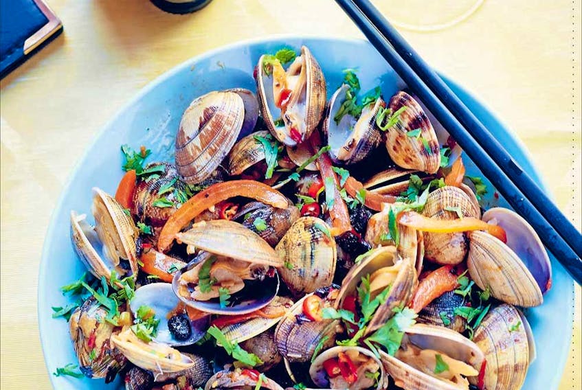  Céline Chung loves the ease of making wok-fried clams: “The simplicity but so much freshness and flavour.”