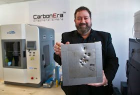 FOR SPURR STORY:
Paul Beasant, CEO at CarbonEra, displays a ballistic armour panel and the bullets that it had stopped, at the company's lab in Dartmouth Monday February 19, 2024. SEE SPURR STORY FOR MORE DETAILS.

TIM KROCHAK PHOTO
