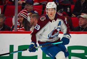 Colorado Avalanche centre Nathan MacKinnon skates against the Carolina Hurricanes during a Feb. 8 game at PNC Arena in Raleigh, N.C. - James Guillory-USA TODAY Sports