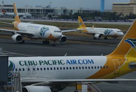 Cebu Pacific passenger jets are pictured at the tarmac of Terminal 3 at the Ninoy Aquino International aiport in Pasay city, Metro Manila Philippines April 1, 2016.