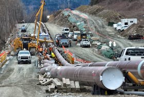 The last section of pipeline is assembled on the Trans Mountain pipeline expansion project before operations are expected to begin in the second quarter of 2024, near Laidlaw, British Columbia, Canada, February 18, 2024. 