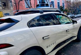 A Waymo rider-only robotaxi is seen during a test ride in San Francisco, California, U.S., December 9, 2022.
