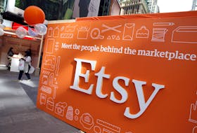 A sign advertising the online seller Etsy Inc. is seen outside the Nasdaq market site in Times Square following Etsy's initial public offering (IPO) on the Nasdaq in New York April 16, 2015.