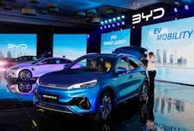 Visitors inspect China's BYD electric vehicles during its launch ceremony in Jakarta, Indonesia, January 18, 2024.