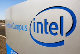 The logo for the Intel Corporation is seen on a sign outside the Fab 42 microprocessor manufacturing site in Chandler, Arizona, U.S., October 2, 2020.