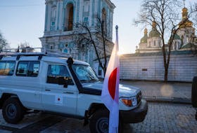 The Japanese national flag is seen during a transfer ceremony of special vehicles from Japan to Ukraine, amid Russia's attack on Ukraine, in Kyiv, Ukraine November 20, 2023.