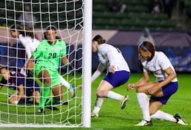 Feb 20, 2024; Carson, California, USA;  United States forward Olivia Moultrie (13) scores a goal against Dominican Republic goalkeeper Paloma Pena (20) during the first half of the 2024 Concacaf W Gold Cup group stage game at Dignity Health Sports Park. Mandatory Credit: Kiyoshi Mio-USA TODAY Sports