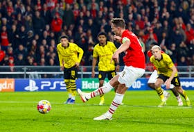 Soccer Football - Champions League - Round of 16 - First Leg - PSV Eindhoven v Borussia Dortmund - Philips Stadion, Eindhoven, Netherlands - February 20, 2024 PSV Eindhoven's Luuk de Jong scores their first goal from the penalty spot