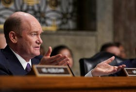 U.S. Senator Chris Coons (D-DE) gestures as he speaks, during the Senate Judiciary Committee hearing on online child sexual exploitation at the U.S. Capitol, in Washington, U.S., January 31, 2024.