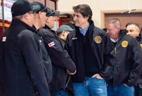 Prime Minister Justin Trudeau meets with first responders at the Eskasoni Fire Station on Feb. 22, 2024.