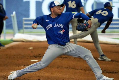 Toronto Blue Jays pitcher Yariel Rodriguez throws during a spring training workout.