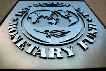 The International Monetary Fund (IMF) logo is seen outside the headquarters building in Washington, U.S., September 4, 2018.