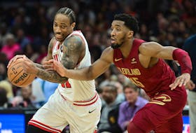Feb 14, 2024; Cleveland, Ohio, USA; Chicago Bulls forward DeMar DeRozan (11) drives to the basket against Cleveland Cavaliers guard Donovan Mitchell (45) during the second half at Rocket Mortgage FieldHouse. Mandatory Credit: Ken Blaze-USA TODAY Sports/File Photo