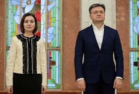Moldova's President Maia Sandu and Prime Minister Dorin Recean attend a ceremony installing newly appointed Foreign Minister Mihai Popsoi in the office in Chisinau, Moldova, January 29, 2024.