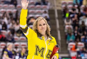 Manitoba’s Jennifer Jones waves to the crowd after winning Draw 16 against Ontario-Inglis in the Scotties Tournament of Hearts at WinSport Arena in Calgary on Wednesday, February 21, 2024.