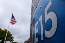 A sign advertising E15, a gasoline that contains 15% ethanol, is seen at a gas station in Clive, Iowa, United States, May 17, 2015.