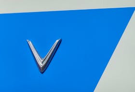A Vinfast electric vehicle logo is shown atop one of the company's retail locations in San Diego, California, U.S.,October 20, 2023.