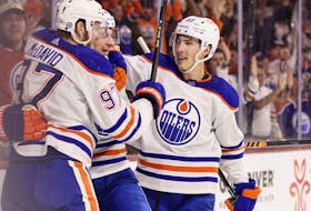 Edmonton Oilers forward Ryan Nugent-Hopkins (93) celebrates a goal with teammates against the Arizona Coyotes at Mullett Arena on Feb. 19, 2024, in Tempe, Az. The Oilers defeated the Coyotes 6-3.