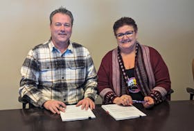 The N.B. government signed a development agreement with Amlamgog (Fort Folly) First Nation to support the community’s priorities related to housing, salmon conservation, a transition to green transportation and entrepreneurship. From left: Indigenous Affairs Minister Mike Holland and Amlamgog Chief Rebecca Knockwood.