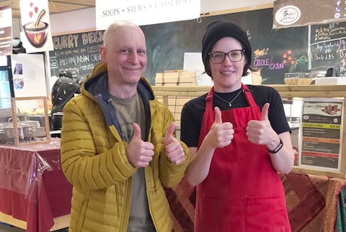 Dave Penny and Emily Hunt at the St. John's Farmers' Market on Feb. 17. Penny said it was his first time back to the market since receiving his diagnosis, and seeing Hunt and everyone was quite emotional.