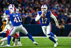 Jan 21, 2024; Orchard Park, New York, USA; Buffalo Bills quarterback Josh Allen (17) runs with the ball against the Kansas City Chiefs in the first half of the 2024 AFC divisional round game at Highmark Stadium. Mandatory Credit: Mark Konezny-USA TODAY Sports/File Photo