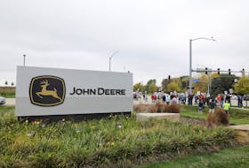 Striking members of the United Auto Workers (UAW) picket at the Deere & Co farm equipment plant before a visit by U.S. Agriculture Secretary Tom Vilsack in Ankeny, Iowa, U.S. October 20, 2021.  